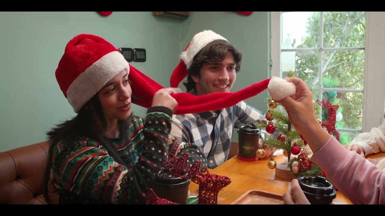 Warmly lit café scene from the Friends Coffee House commercial